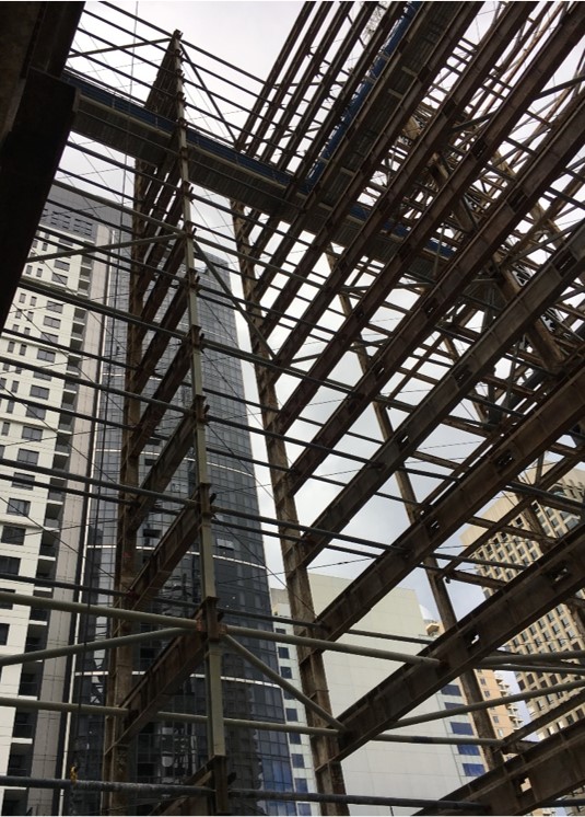 Inside the void where the new tower lift core would eventually be built. The retained primary steel frame can be seen, along with temporary steel bracing elements used to maintain temporary frame stability