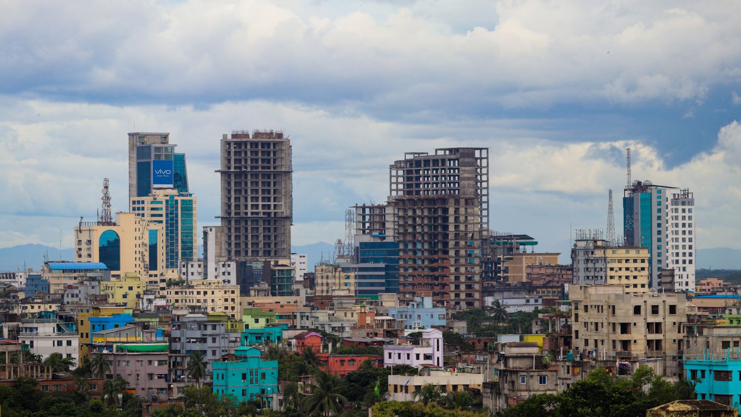 Skyline of Chittagong, Bangladesh, with cloudy sky (ID 231656511 © Morshed Alam | Dreamstime.com)