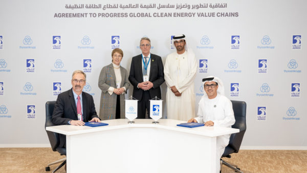 Cord Landsmann and Musabbeh Al Kaabi signing the agreement in Abu Dhabi this week (ADNOC)