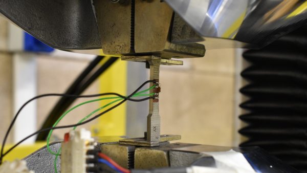 A 3D-printed steel sample undergoing a tensile test to measure its mechanical properties (Photographs courtesy of ConstructAdd)