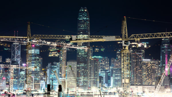 Construction in front of Hong Kong’s skyline (Avesun/Dreamstime)
