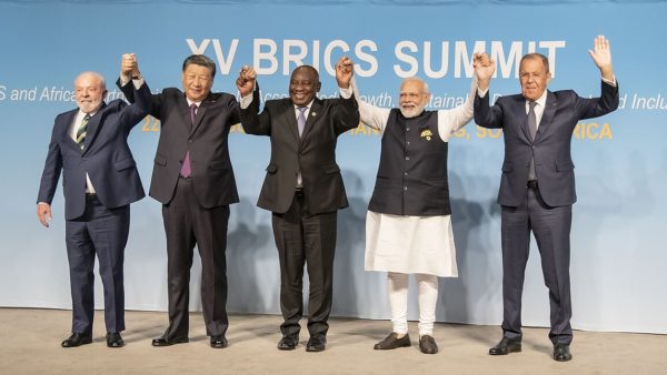 The 15th BRICS Summit “family photo”, August 2023. From left, President Lula da Silva of Brazil, President Xi Jinping of China, President Cyril Ramaphosa of South Africa, Prime Minister of India Narendra Modi, and Russian Foreign Minister Sergei Lavrov (15th BRICS Summit/PDM 1.0 Deed/Public domain)