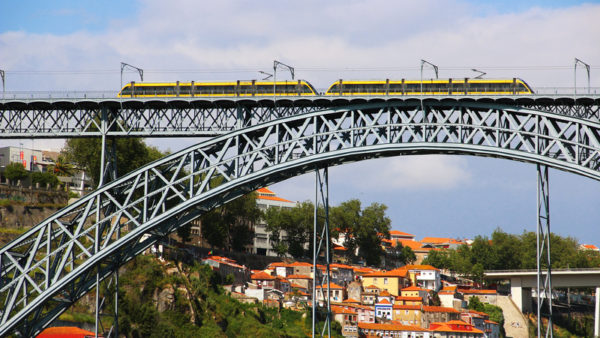 Trains on Porto’s Dom Luis Bridge (Olena Buyskykh/Dreamstime)