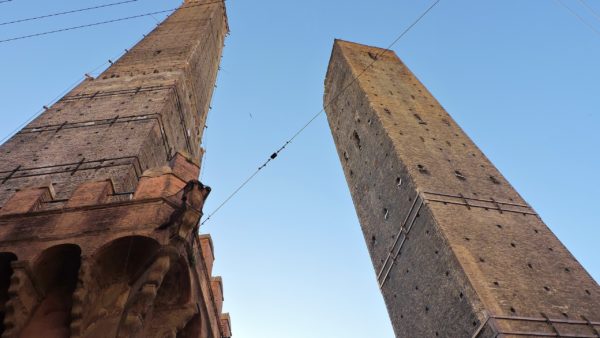 A “yellow” alert is in place for the medieval Garisenda Tower, on the right, that leans at 4 degrees (Dimitris Kamaras/CC BY 2.0 Deed)